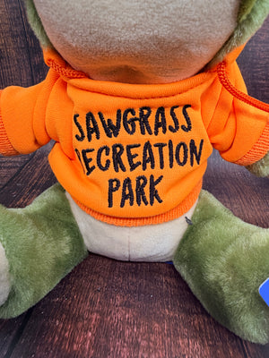 Allie Gator in a Sawgrass Recreation Park Hoodie in Orange