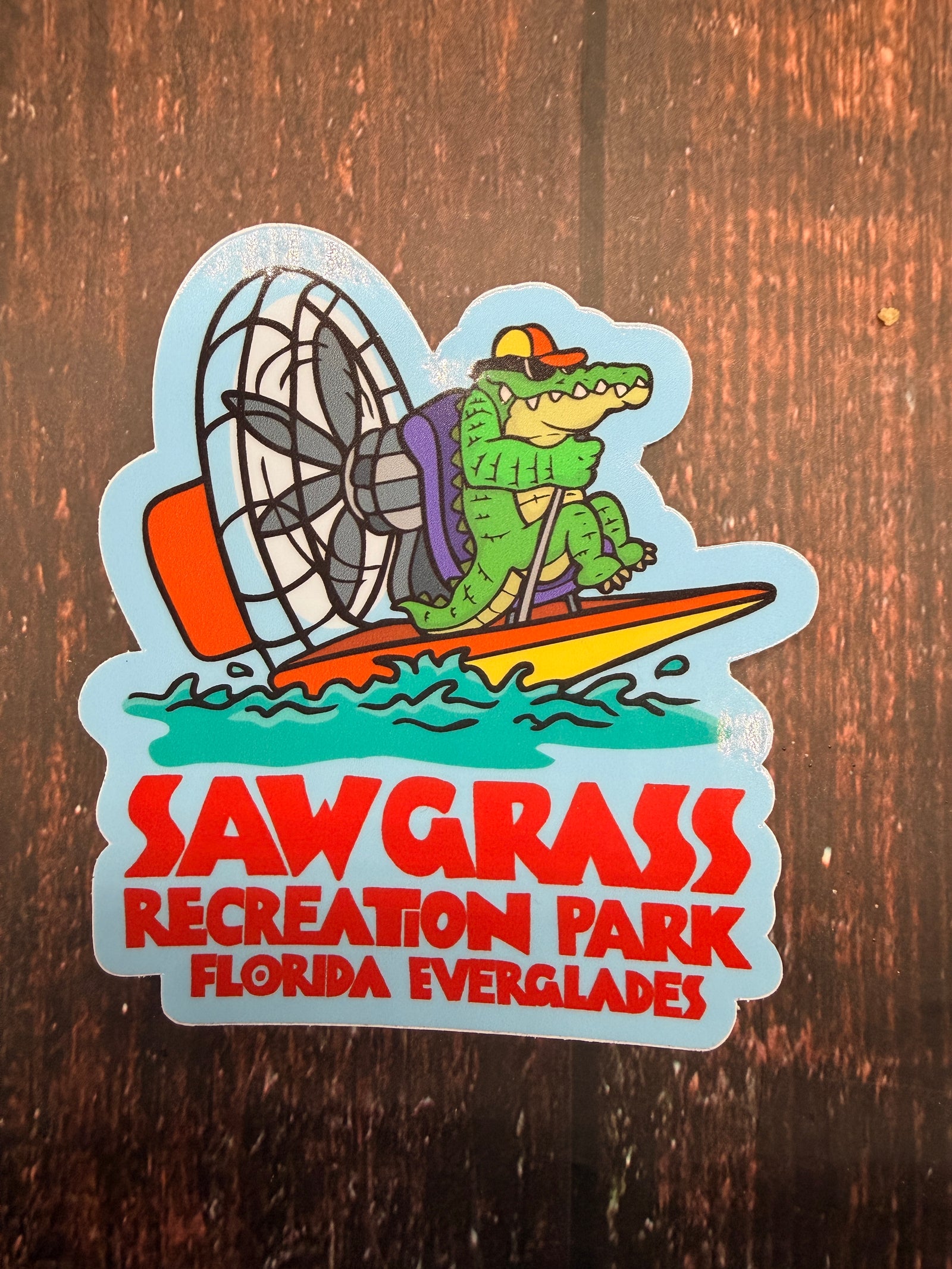 Custom Sawgrass Sticker Gator Driving an Airboat
